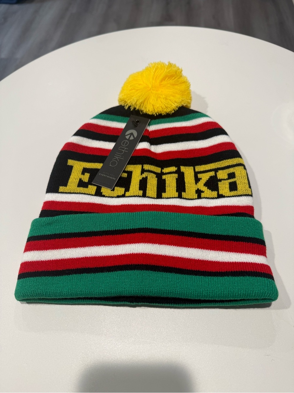 Ethika Women’s Striped Pom Beanie in Green, Red, Black, White & Yellow